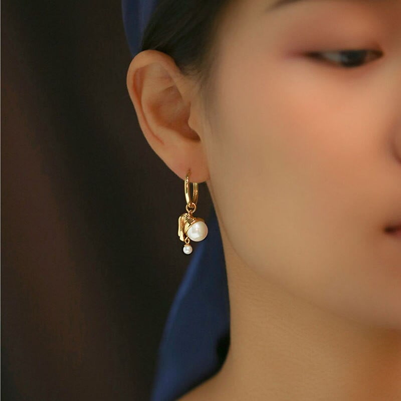 Pendientes vintage chica con una perla