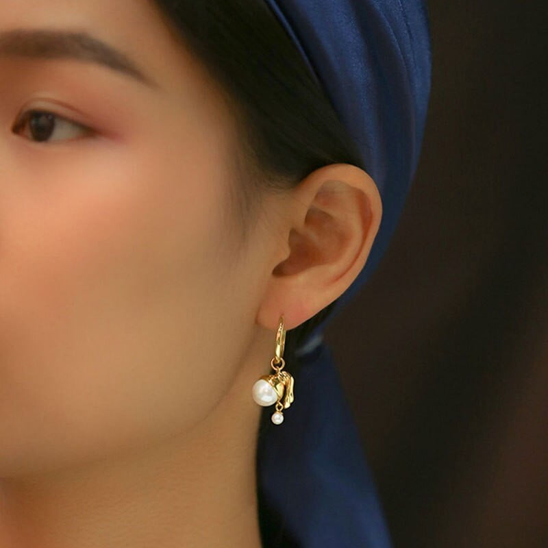 Pendientes vintage chica con una perla
