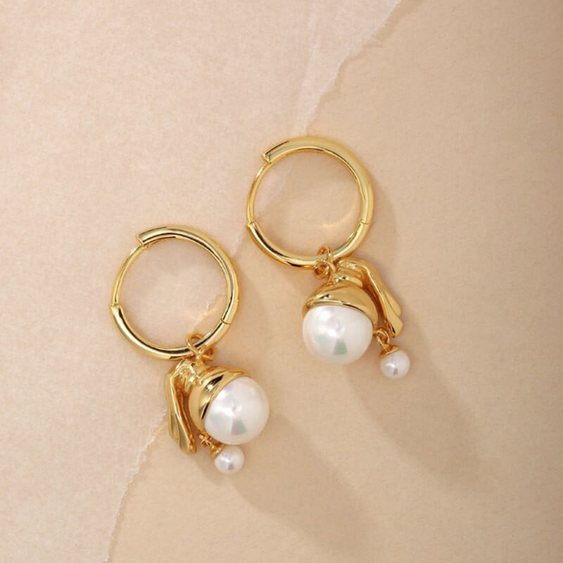 Pendientes vintage chica con una perla