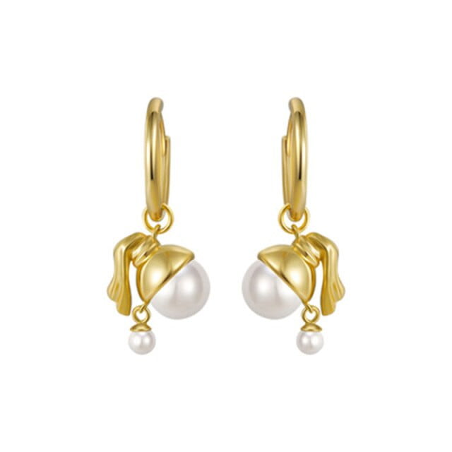 Pendientes vintage chica con una perla