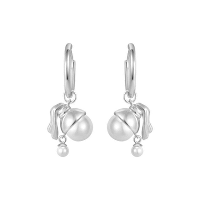 Pendientes vintage chica con una perla