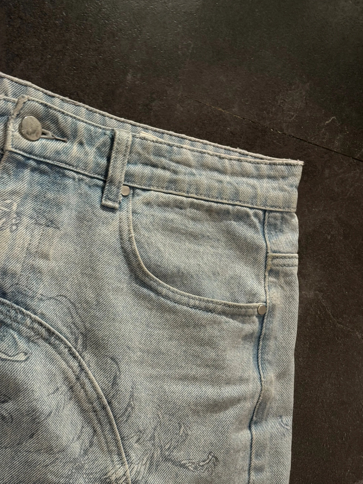 Cherub Engraving Baggy Jeans — product photograph