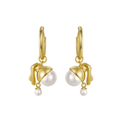 Pendientes vintage chica con una perla